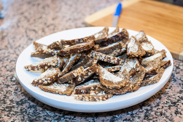 small pieces of buttered bread