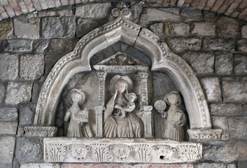 Wall sculpture of main gate in Kotor old town, Montenegro.