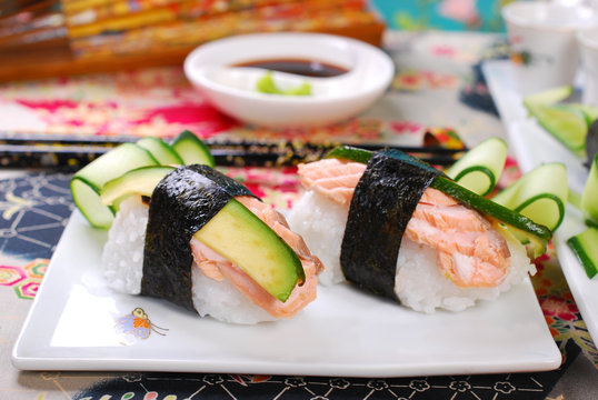nigiri sushi with salmon and avocado