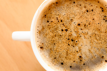 Beverage. Cup of hot drink coffee with froth.