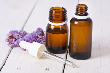 bottles of massage oil and aromatherapy spa