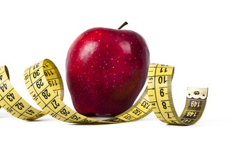 apple with tape measure, concept of healthy eating, lifestyle