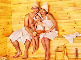 Group people in hat  at sauna.