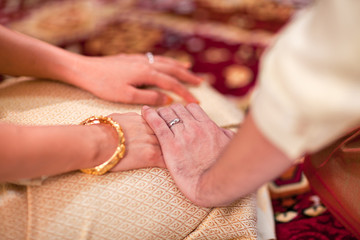 couple holding hand