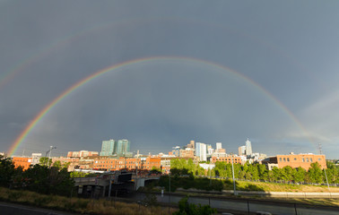 Fototapeta na wymiar Double Rainbow Over Denver Colorado Skyline