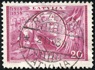 stamp printed by Latvia, shows President Karlis Ulmanis