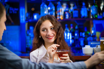 young woman in a bar