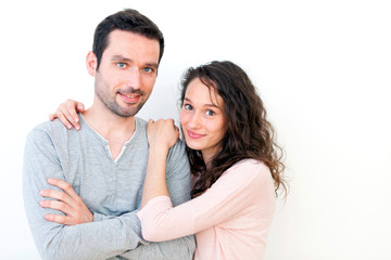 Portrait of a young happy couple on a white background