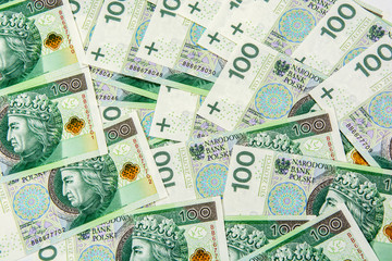Fototapeta na wymiar Background of 100 PLN (polish zloty) banknotes