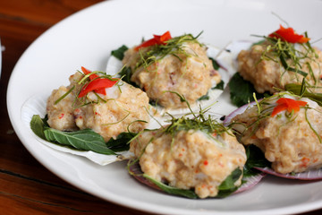 steamed fish with curry paste serve on shell