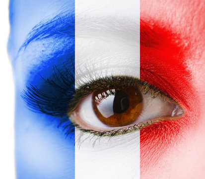 Human face painted with flag of France