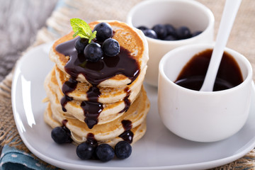 Eggless pancakes with blueberries and chocolate