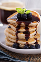Eggless pancakes with blueberries and chocolate