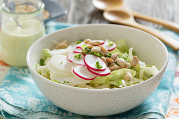 Salad with fresh cabbage, radishes