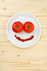 Fun food for children - tomatoes making smiley face