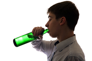 Young Man drinks a Beer