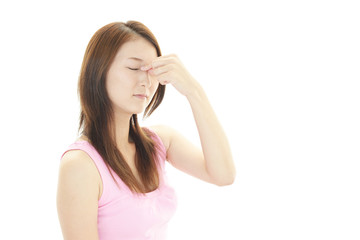 頭痛を訴える女性