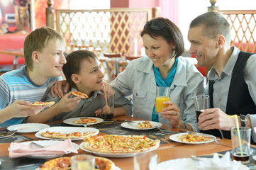 Family eating pizza