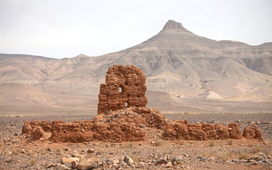Ruins of clay building near Atlas mountains, Morocco
