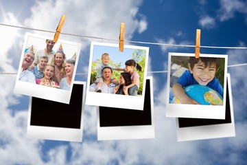 Composite image of instant photos hanging on a line