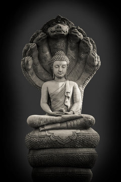 Light of Buddha image in the dark background.