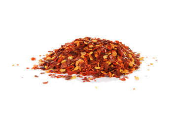 Pile of red pepper flakes on a white background