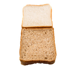 Whole Wheat Bread and Sandwich Bread Over White Background