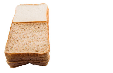 Fototapeta na wymiar Whole Wheat Bread and Sandwich Bread Over White Background