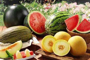 Selbstklebende Fototapeten melons and watermwlons © MIGUEL GARCIA SAAVED