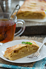 Apple strudel with tea