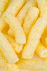 crunchy corn snacks isolated on white