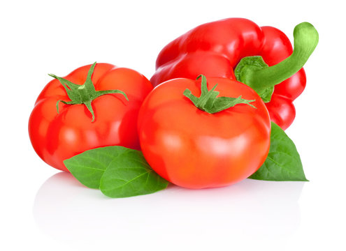 Two Tomatoes, Sweet Red Peppers And Leaves Isolated On A White B