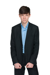Confident teen boy in a black suit
