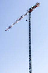 Construction Crane against Clear Blue Sky