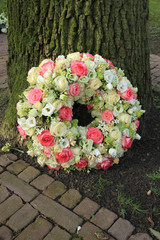Sympathy wreath near tree