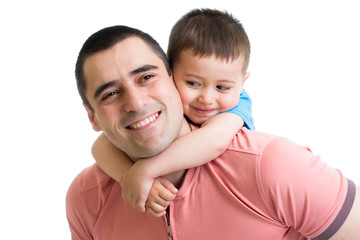 happy kid boy embracing his father