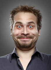 Obraz premium A man with a beard and mustache expression of happiness on her f