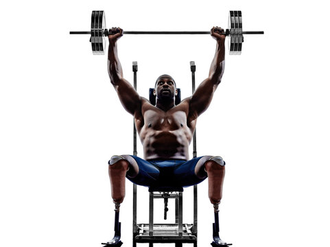 handicapped body builders building weights man with legs prosthe