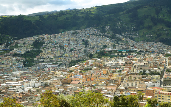 Views of colorful buildings in Quito