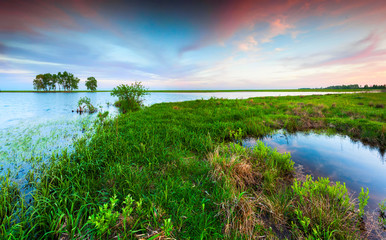 Colorful spring landscape on the lake
