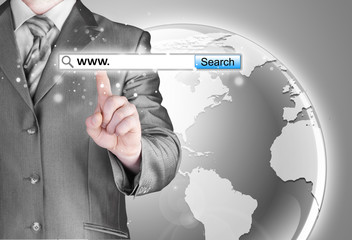 Businessman pushing virtual search bar