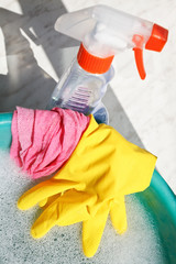 rubber glove, duster, spray bottle, soapsuds water