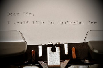 Text Dear Sir typed on old typewriter