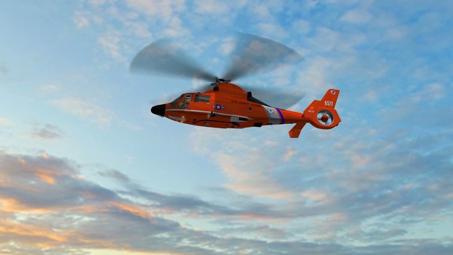 Coast Guard Helicopter fly  in the sunset