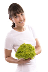 Smiling woman with green salad, isolated on white