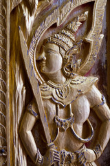 Carved door in buddhist style