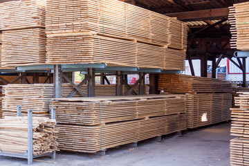 Wooden panels stored inside a warehouse