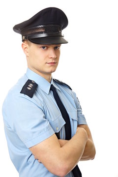 Portrait of young policemen standing in uniform
