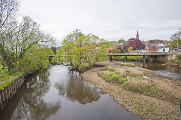 Fototapeta na wymiar Rural scene down english river with bridge