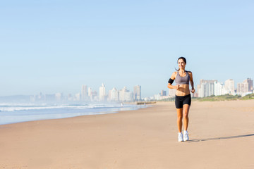 woman jogging on beach